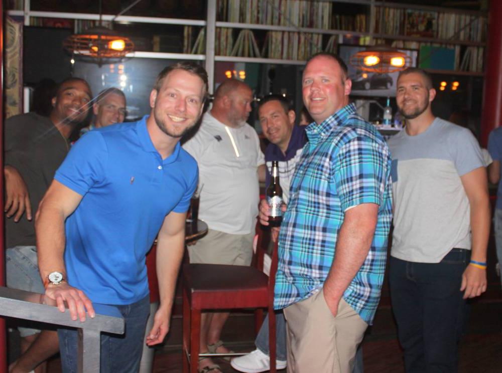 group of men at bar